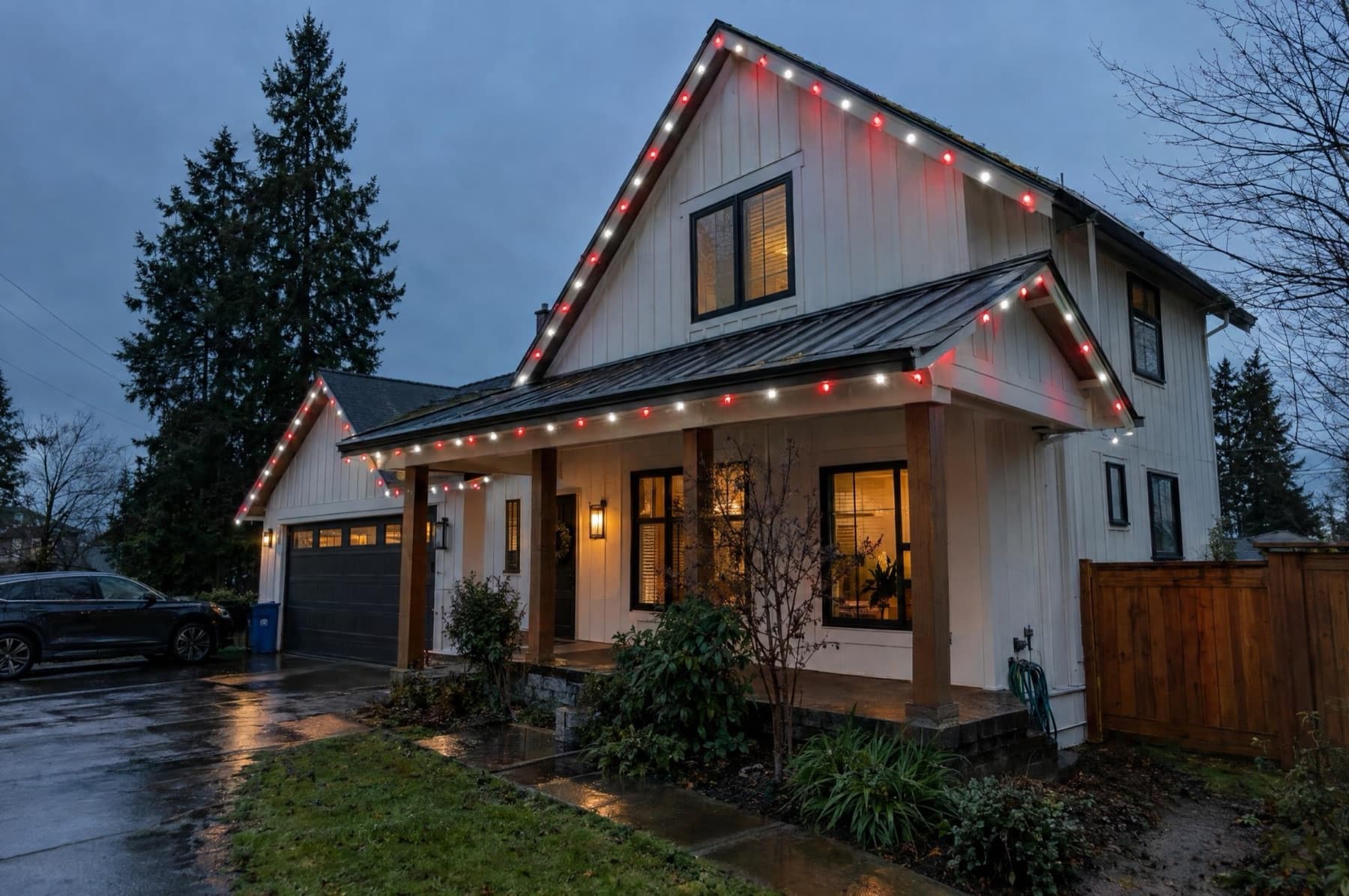 Farmhouse roofline with C9 bulbs in a white channel in a red and white pattern